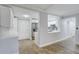Living area with open view to kitchen and adjacent appliances at 4141 Bayshore Blvd # 306, Tampa, FL 33611