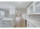 Bright living room with stainless steel appliances, wine cooler, white cabinetry and backsplash tiling at 4141 Bayshore Blvd # 306, Tampa, FL 33611