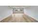 Bright, open living room boasts hardwood floors and natural light from the multiple windows at 4141 Bayshore Blvd # 306, Tampa, FL 33611