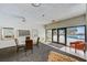 A community room with a small table for sitting and paintings on the wall, access to the pool at 4141 Bayshore Blvd # 306, Tampa, FL 33611