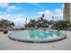 Resort-style pool with lush landscaping and comfortable lounge seating for residents at 4141 Bayshore Blvd # 306, Tampa, FL 33611