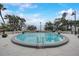 Resort-style pool with lush landscaping and comfortable lounge seating for residents at 4141 Bayshore Blvd # 306, Tampa, FL 33611