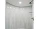 Tiled walk-in shower features sleek hardware and bright lighting at 4141 Bayshore Blvd # 306, Tampa, FL 33611