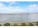 Beautiful water view overlooking the wide bay with street, sidewalks and trees below at 4141 Bayshore Blvd # 306, Tampa, FL 33611