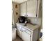 Kitchen offers a cooking area featuring cabinets and countertop space at 4217 Tamargo Dr # A, New Port Richey, FL 34652