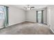 Neutral bedroom with plush carpeting, a ceiling fan, and lots of natural light at 4527 24Th S Ave, St Petersburg, FL 33711