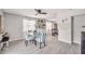 Dining room with modern table and chairs with view to the kitchen at 4527 24Th S Ave, St Petersburg, FL 33711