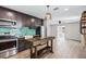 Bright kitchen with stainless steel appliances, wooden countertops, and stylish modern lighting at 4527 24Th S Ave, St Petersburg, FL 33711
