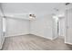 Large living room with neutral walls, fan and floors and lots of natural light at 4527 24Th S Ave, St Petersburg, FL 33711