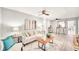 Bright living room with modern decor, plush seating, and open layout to the bar area at 4527 24Th S Ave, St Petersburg, FL 33711