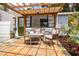 Close-up of a charming patio with comfortable seating and a decorative pergola, perfect for relaxation at 4527 24Th S Ave, St Petersburg, FL 33711