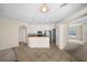 Open concept living space featuring the kitchen, bar seating, easy access to the dining and living rooms at 4538 Appleton Ter, North Port, FL 34286