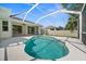 Private backyard pool featuring a screened enclosure with ample space for lounging and enjoying outdoor living at 4538 Appleton Ter, North Port, FL 34286