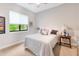 Bedroom with window, neutral carpet, and soft colors at 4581 Majestic Hills Loop, Brooksville, FL 34601