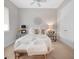 This bedroom features a ceiling fan and a double door closet at 4581 Majestic Hills Loop, Brooksville, FL 34601