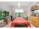 Spacious dining room with large windows and a view of the backyard at 4581 Majestic Hills Loop, Brooksville, FL 34601