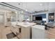 Open concept kitchen with a large center island, stainless steel appliances and view to the Gathering room at 4581 Majestic Hills Loop, Brooksville, FL 34601