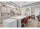 Kitchen with island, breakfast bar and stainless steel appliances in an open concept living space at 4581 Majestic Hills Loop, Brooksville, FL 34601