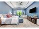 This stylish main bedroom features recessed lighting and a calming color scheme at 4581 Majestic Hills Loop, Brooksville, FL 34601