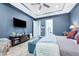 This spacious bedroom features a walk-in closet and an ensuite bathroom at 4581 Majestic Hills Loop, Brooksville, FL 34601