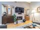 Inviting living room features a cozy fireplace, hardwood floors, and thoughtfully placed decor at 5010 Umber N Way, Tampa, FL 33624