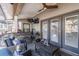 Relaxing outdoor patio with bar, seating, ceiling fan, and an outdoor kitchen, perfect for entertaining at 5010 Umber N Way, Tampa, FL 33624
