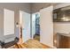 This home includes a spacious walk-in closet with custom shelving for optimal organization at 5010 Umber N Way, Tampa, FL 33624
