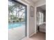 Inviting screened-in pool with lounge chairs, perfect for relaxing and enjoying the beautiful Florida weather at 5519 Greyston St, Palm Harbor, FL 34685