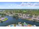 Aerial view of waterfront community with access to water, golf course, and more at 6490 Cape Hatteras Ne Way # 4, St Petersburg, FL 33702