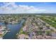 An aerial shot of the community near the water with easy access to the city and nearby attractions at 6490 Cape Hatteras Ne Way # 4, St Petersburg, FL 33702