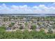 Waterfront community aerial showcasing beautiful landscaping, tranquil waterways, and stunning coastal views at 6490 Cape Hatteras Ne Way # 4, St Petersburg, FL 33702