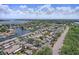 Aerial shot showcasing the community, waterfront access, and proximity to the ocean at 6490 Cape Hatteras Ne Way # 4, St Petersburg, FL 33702