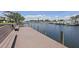 A waterfront deck offers beautiful water views and access for boating activities at 6490 Cape Hatteras Ne Way # 4, St Petersburg, FL 33702