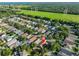 This beautiful home is nestled in a neighborhood with mature trees and lush greenery, offering a serene and peaceful environment at 6933 Waterbrook Ct, Gibsonton, FL 33534