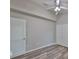 Nicely staged bedroom with laminate floors, neutral paint, and standard closets at 6933 Waterbrook Ct, Gibsonton, FL 33534