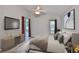 Serene bedroom featuring a sliding door to the backyard and relaxing decor at 6933 Waterbrook Ct, Gibsonton, FL 33534