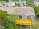 Backyard home exterior showing an elevated wooden deck at 7647 Navigator Ct, Port Richey, FL 34668