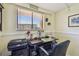 Bright home office space with large window, desk and office chair at 9450 Harbor Greens Way # 403, Seminole, FL 33776