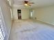 Bright living room features recessed lighting and views of the backyard at 10206 Lakeview Dr, New Port Richey, FL 34654