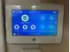 Image of a modern home security system panel displaying 'Ready to Arm-Chime' and various security options at 10206 Lakeview Dr, New Port Richey, FL 34654