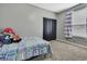Bedroom with carpeted floor, window and closet at 10322 Riverburn Dr, Tampa, FL 33647