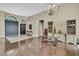 Bright foyer featuring high ceilings, hardwood floors, and a decorative tile entryway at 10322 Riverburn Dr, Tampa, FL 33647