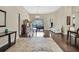 Bright and airy living room with hardwood floors and pool view at 10322 Riverburn Dr, Tampa, FL 33647