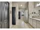 Spacious main bathroom with a shower, soaking tub and dual vanities at 10322 Riverburn Dr, Tampa, FL 33647