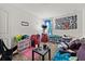 Functional bedroom decorated with personal items, offering potential for customization and comfortable living at 11841 Thicket Wood Dr, Riverview, FL 33579