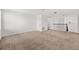 Bonus room featuring carpeted floors and staircase at 11841 Thicket Wood Dr, Riverview, FL 33579