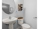 Bright half-bath with stylish fixtures offers a clean and functional space for guests at 11854 Lake Lucaya Dr, Riverview, FL 33579
