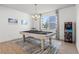 Recreation room featuring a pool table, modern light fixture, artwork and game machine at 11854 Lake Lucaya Dr, Riverview, FL 33579
