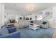 Spacious open concept living room with hardwood floors, modern furniture and natural light at 11854 Lake Lucaya Dr, Riverview, FL 33579