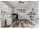 Bright home office with large windows, a ceiling fan and plenty of workspace at 11854 Lake Lucaya Dr, Riverview, FL 33579